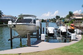 boat lift and jetski lift off homeowners deck in naples florida | Naples Marine Construction - Naples, Florida